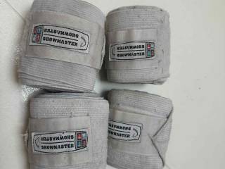 Białe owijki elastyczno-polarowe Showmaster 4 szt